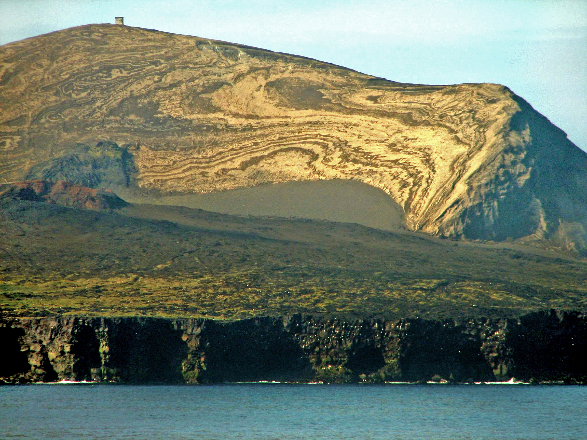 View of Iceland's not-so-old Surtsey Island from its coastal cliffs